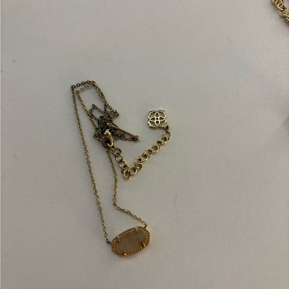 Kendra Scott earrings and necklace